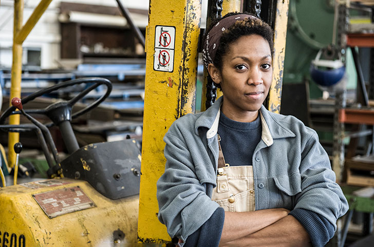 black-woman-factory-worker-and-a-fork-lift-in-a-sh-2021-08-28-08-10-42-utc.jpg Black woman working in a car factory