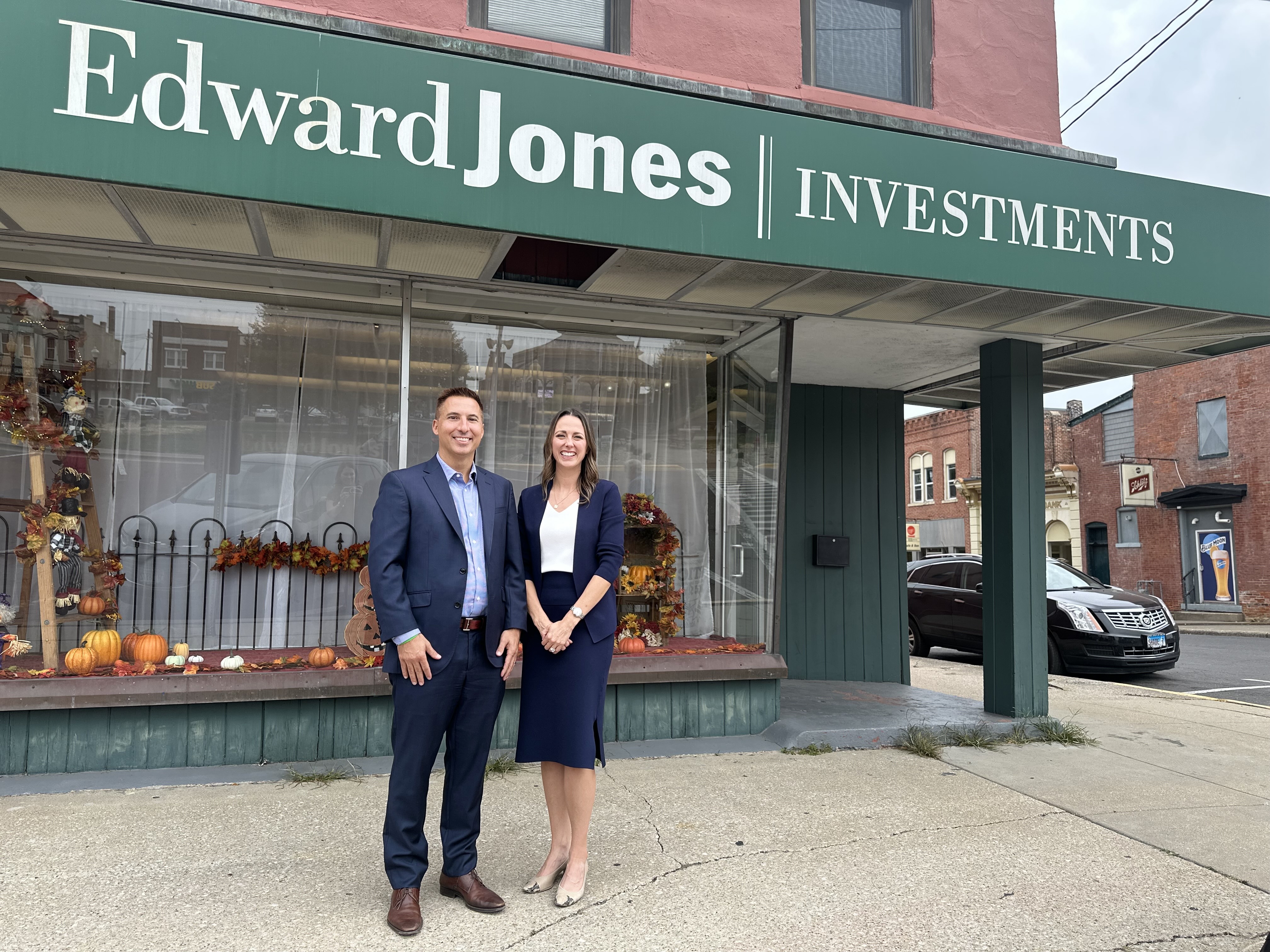 Jason Hall stands in front of an Edward Jones office in Carlinville, IL