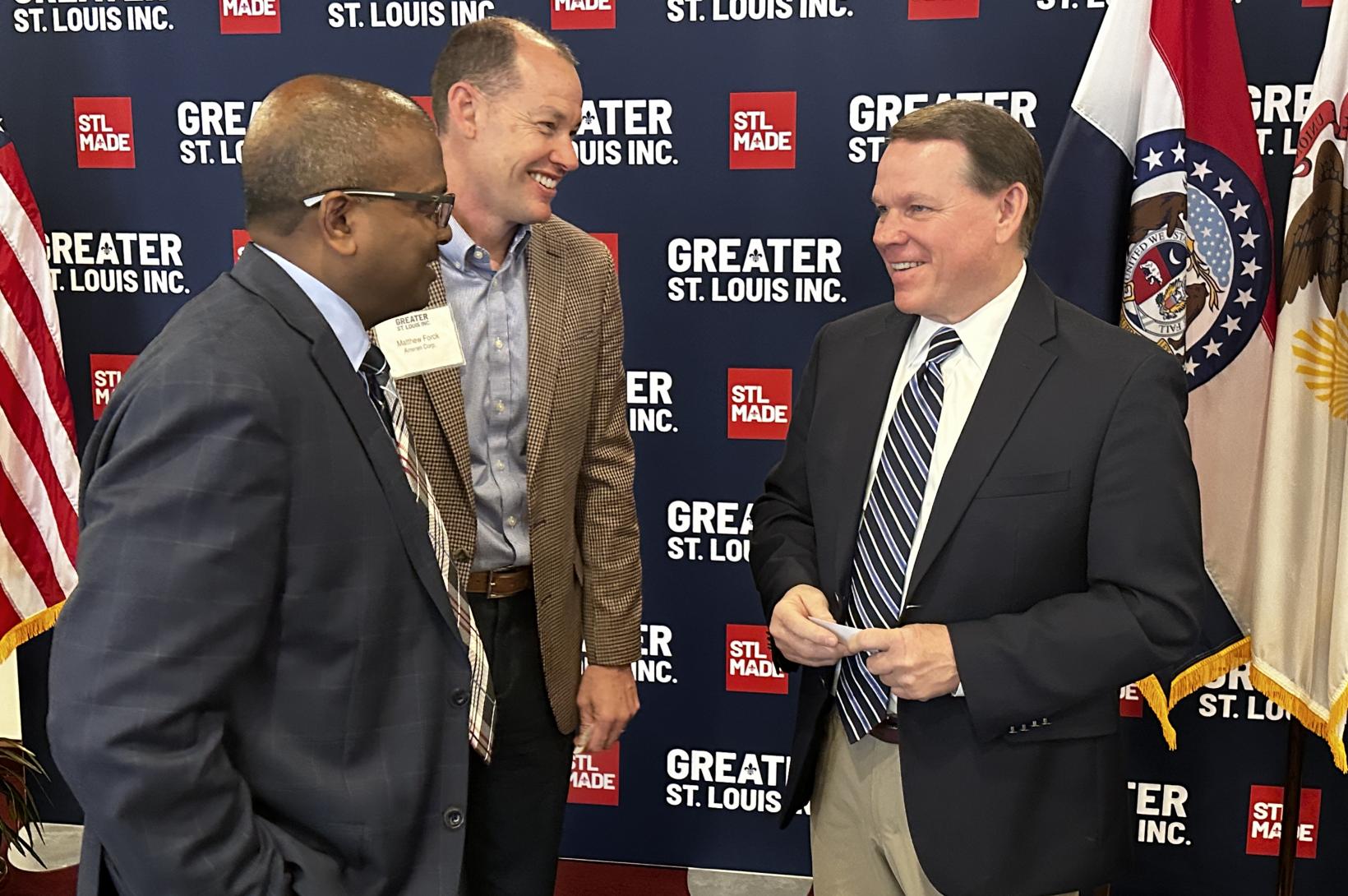 Congressman Sam Graves Congressman Sam Graves laughs to two Greater St. Louis, Inc. investors.