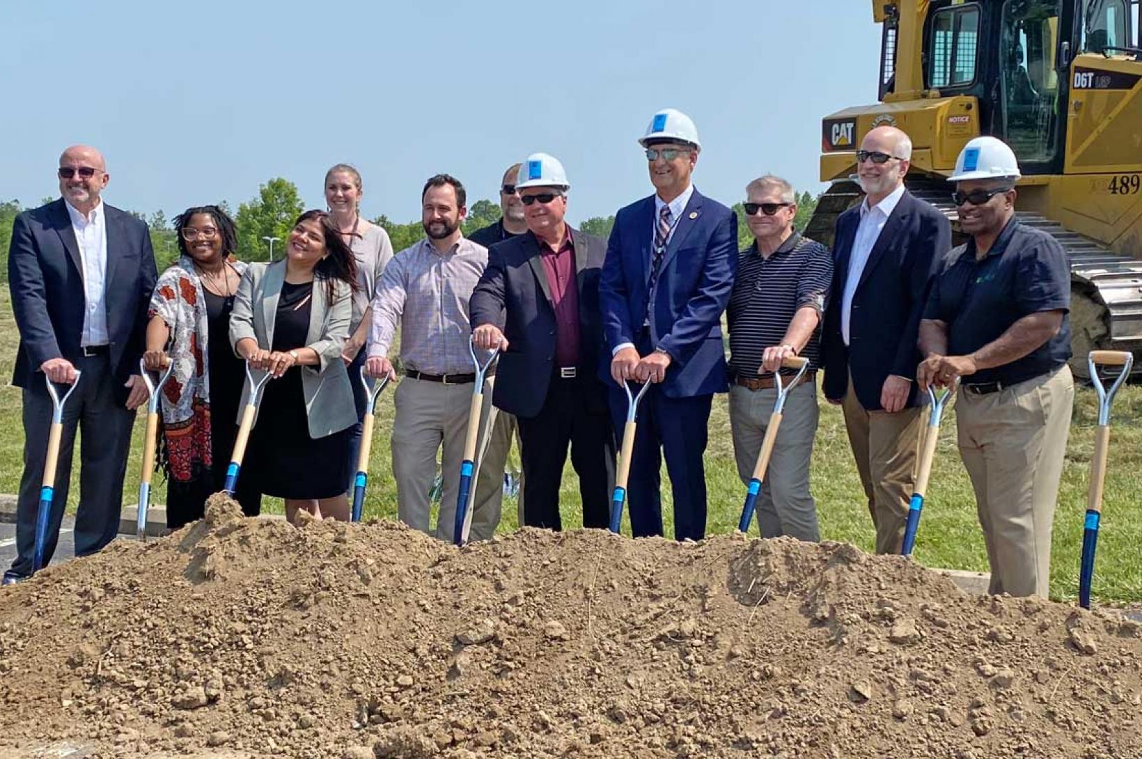 STLCC Groundbreaking at Wildwood STLCC Groundbreaking: a line of St. Louis leaders holding shovels